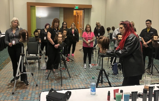 2024 Battle of the Hair Winners taking a hands-on haircutting class with their instructors and Sexy Hair Educator, Katrina Cahill