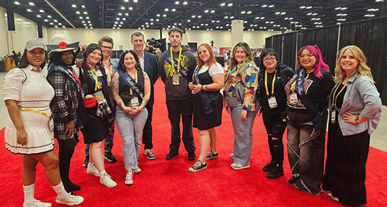 Students and instructors with Edward Logan, Sport Clips CEO