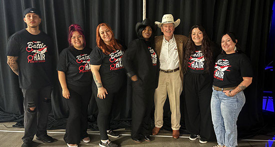 Students with Gordon Logan, Sport Clips Founder