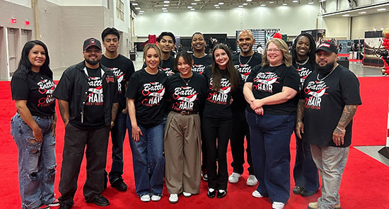 Student winners posing with their instructors